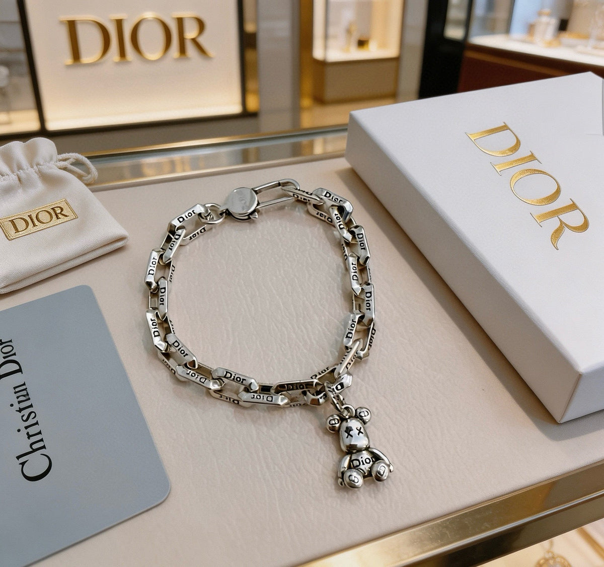 Martin Graham pendant necklace in polished metal-tone – detail view