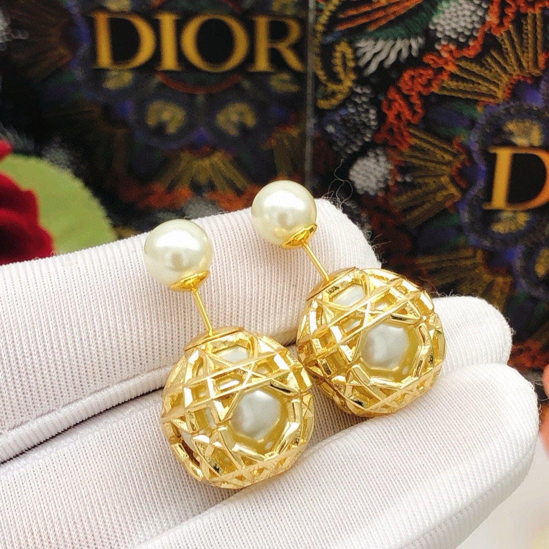 Martin Graham stud earrings in polished metal-tone – detail view
