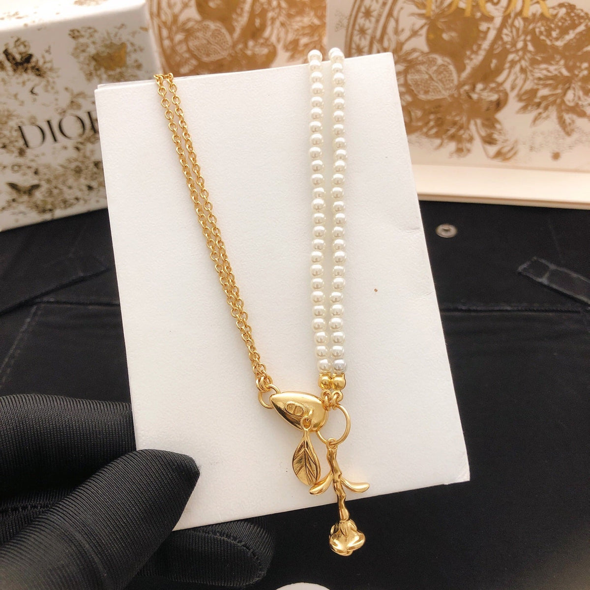 Martin Graham pendant necklace in polished metal-tone – detail view