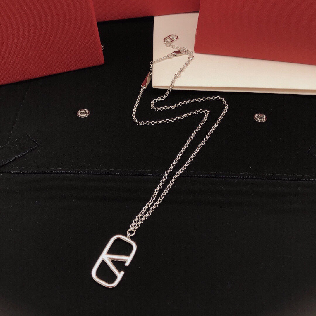 Martin Graham pendant necklace in polished metal-tone – detail view