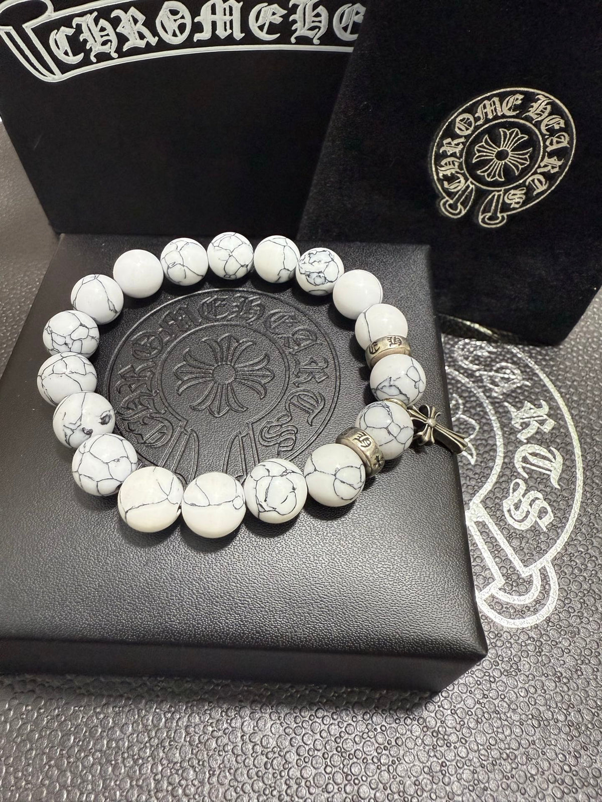Martin Graham jewelry accessory in polished metal-tone – detail view