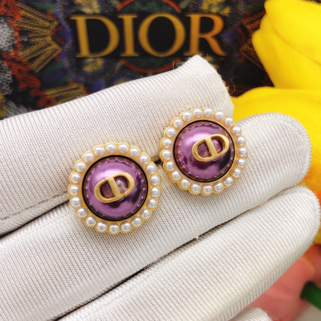 Martin Graham stud earrings in polished metal-tone – detail view