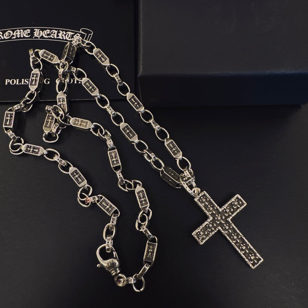 Martin Graham pendant necklace in polished metal-tone – detail view