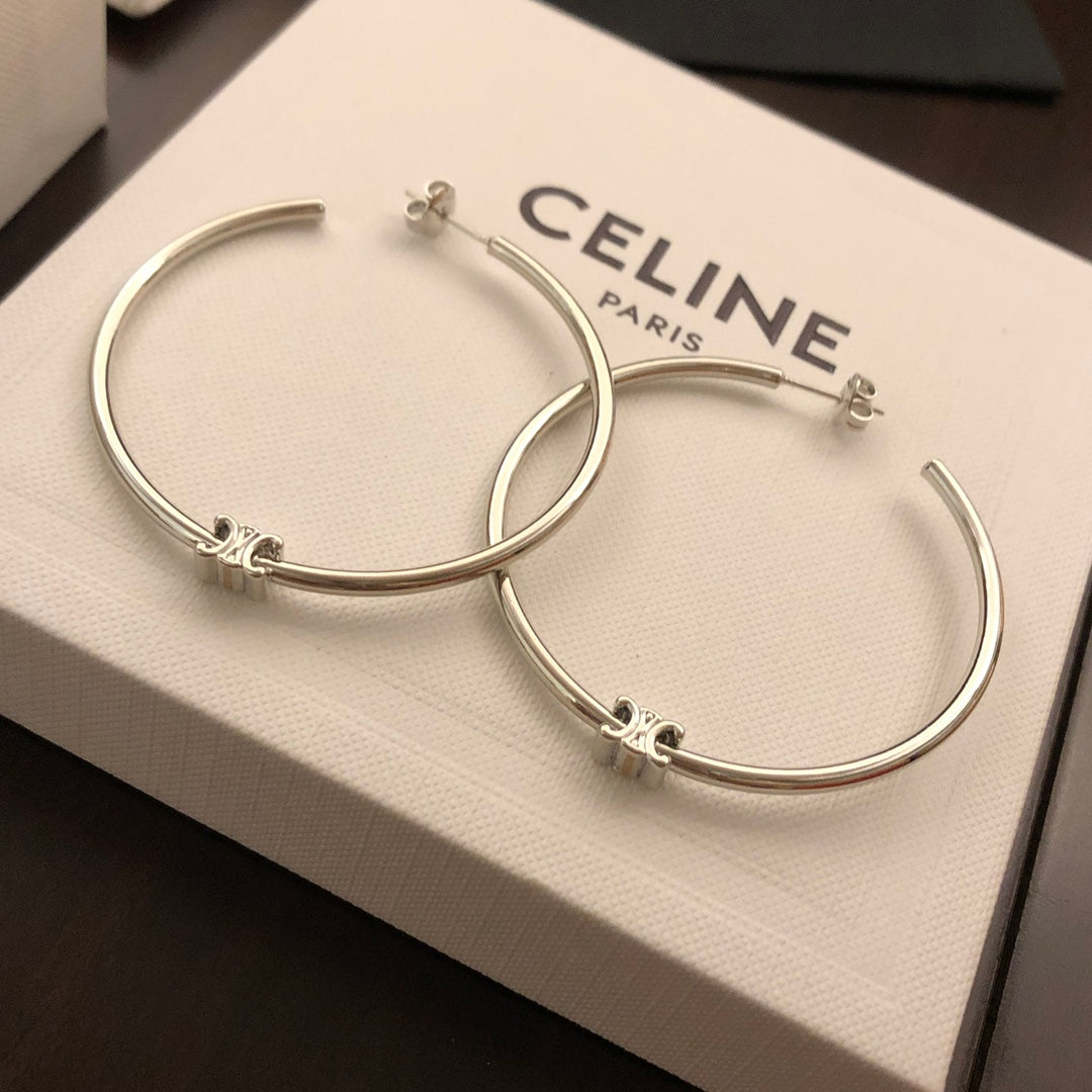 Martin Graham earrings in polished metal-tone – detail view