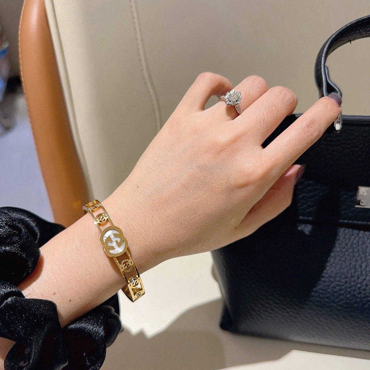 Martin Graham bangle in polished metal-tone – detail view