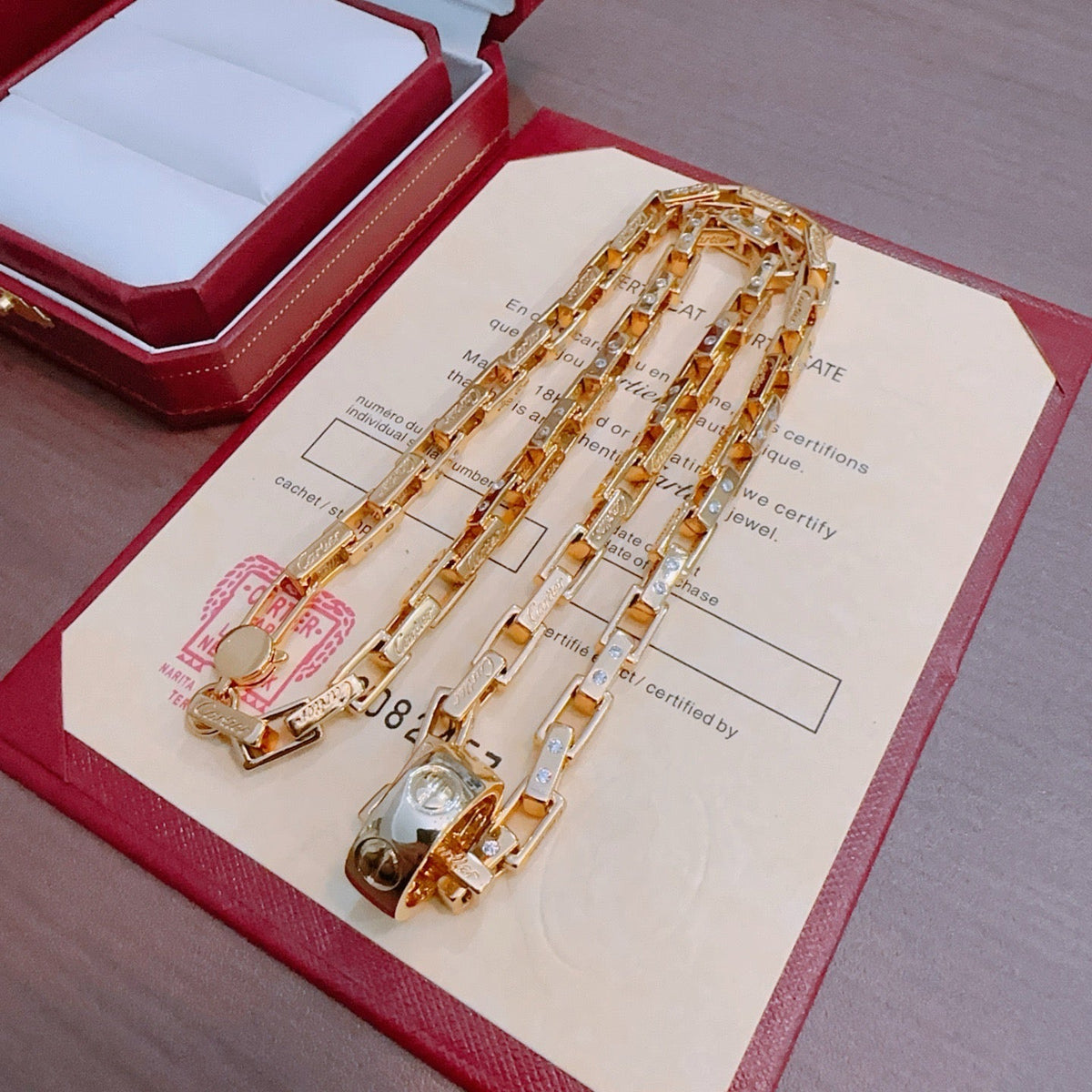 Martin Graham pendant necklace in polished metal-tone – detail view