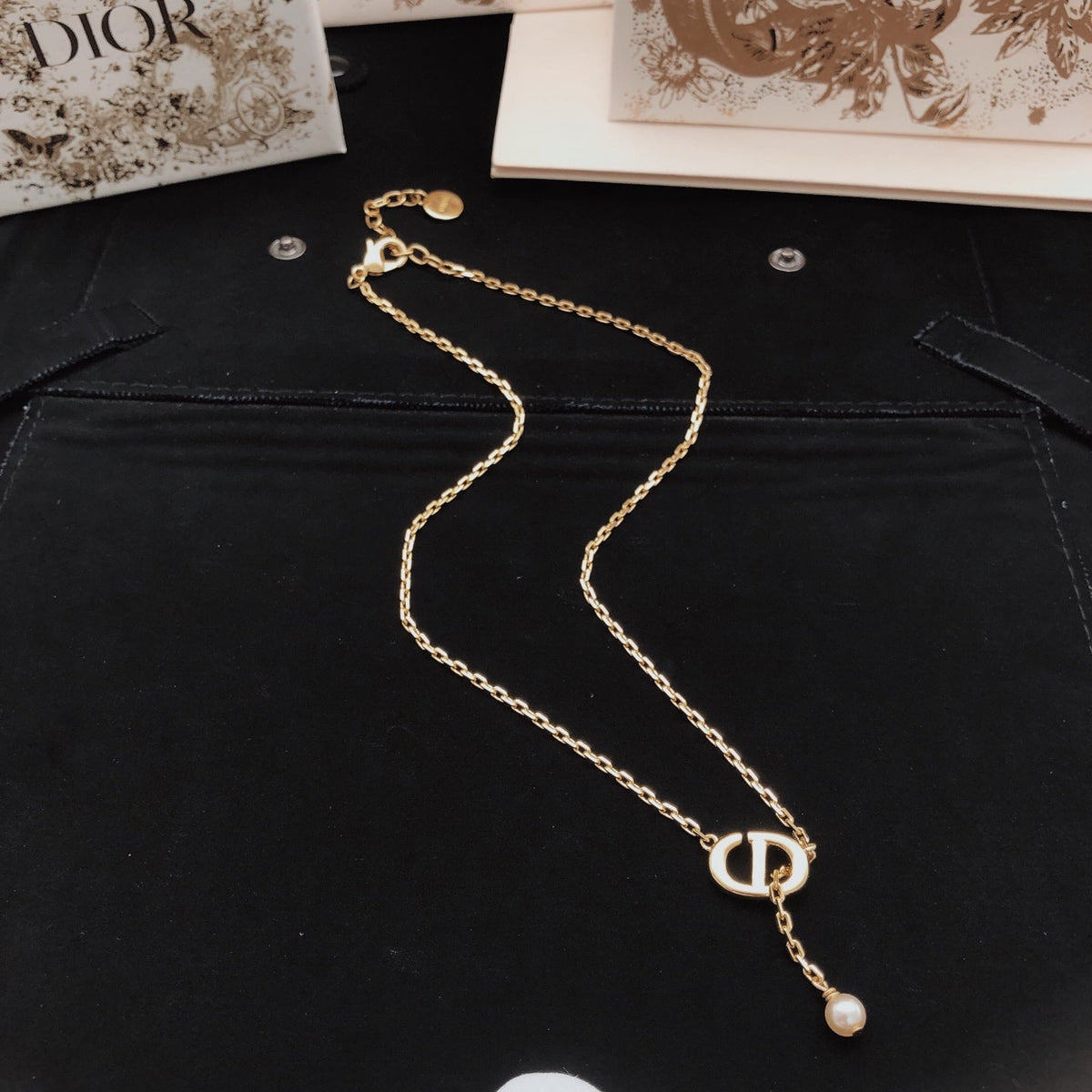 Martin Graham pendant necklace in polished metal-tone – detail view