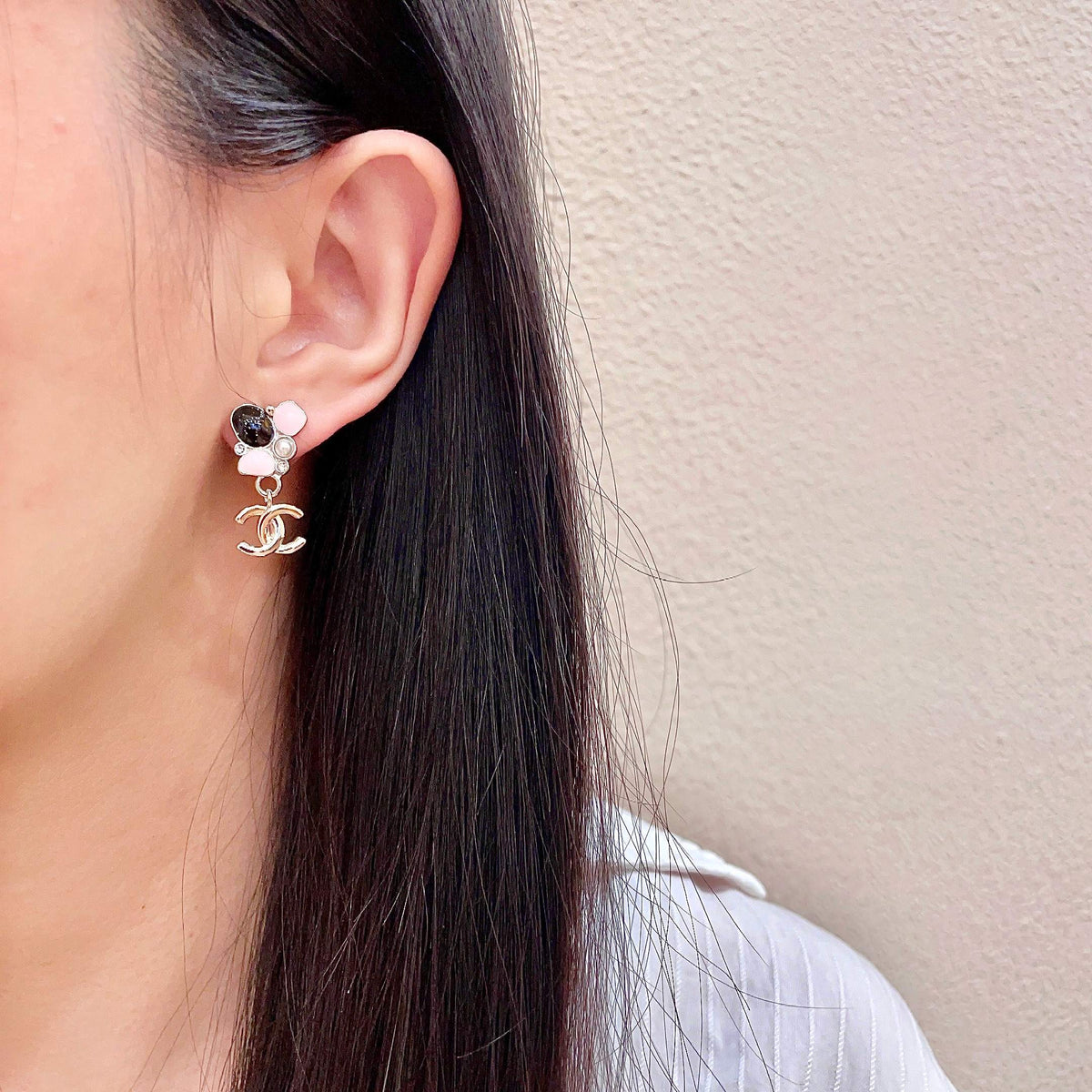 Martin Graham stud earrings in polished metal-tone – detail view