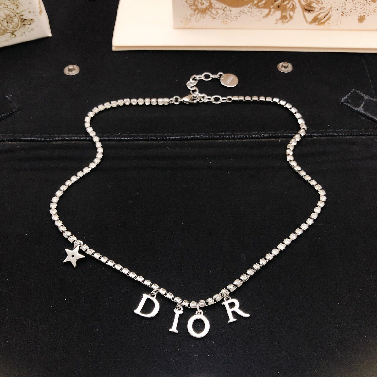 Martin Graham pendant necklace in polished metal-tone – detail view