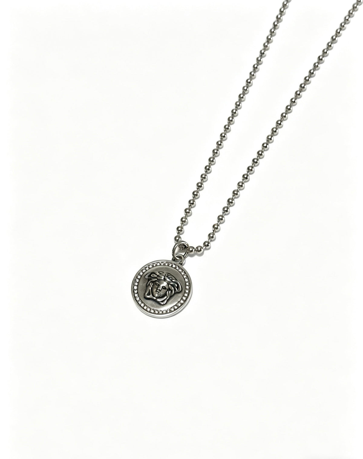 Martin Graham pendant necklace in polished metal-tone – detail view
