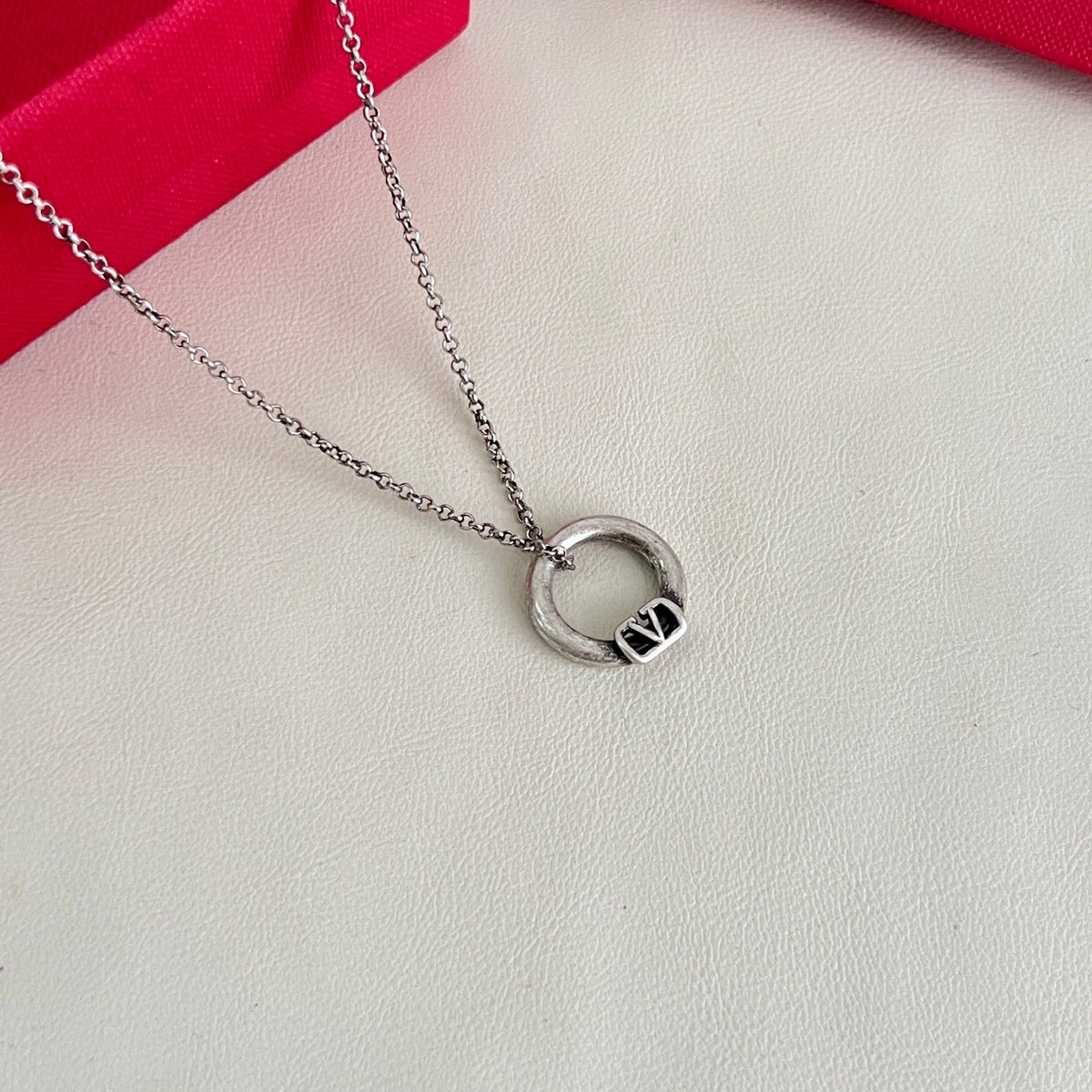 Martin Graham pendant necklace in polished metal-tone – detail view