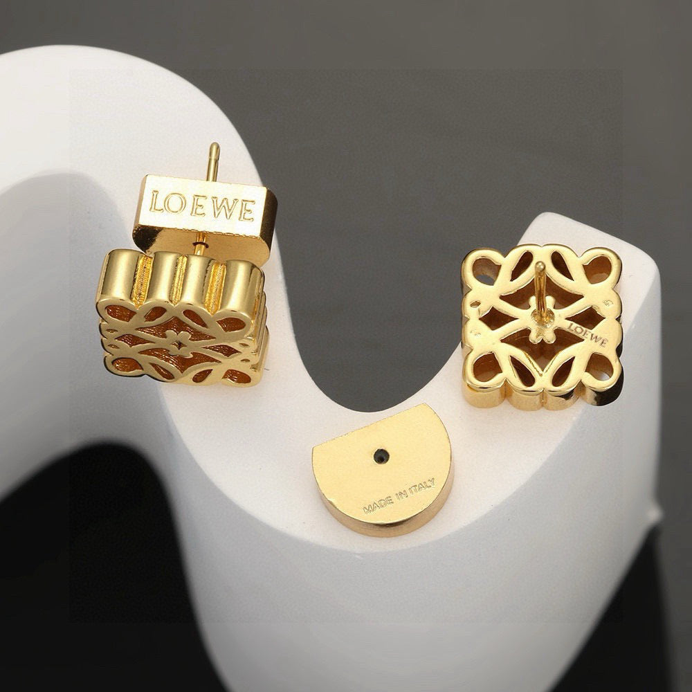 Martin Graham stud earrings in polished metal-tone – detail view