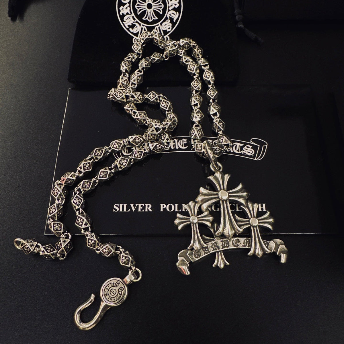 Martin Graham pendant necklace in polished metal-tone – detail view