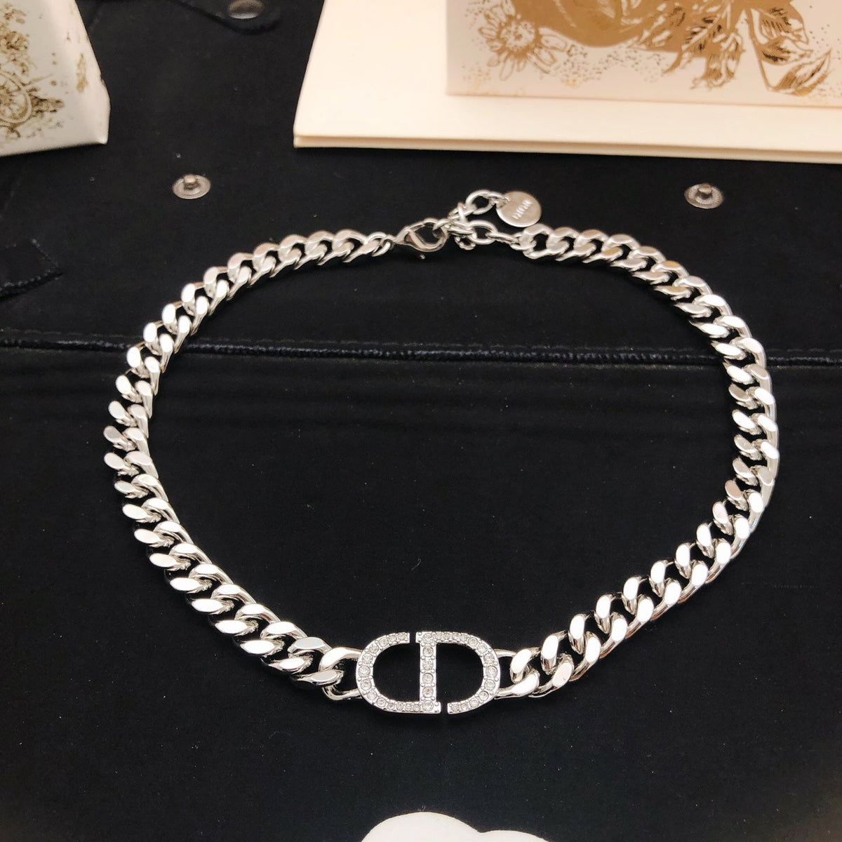 Martin Graham pendant necklace in polished metal-tone – detail view