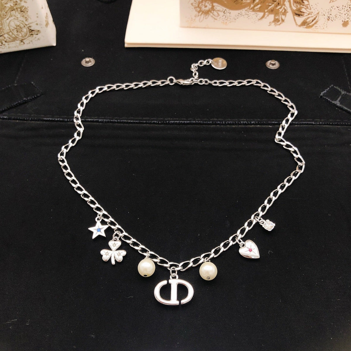 Martin Graham pendant necklace in polished metal-tone – detail view