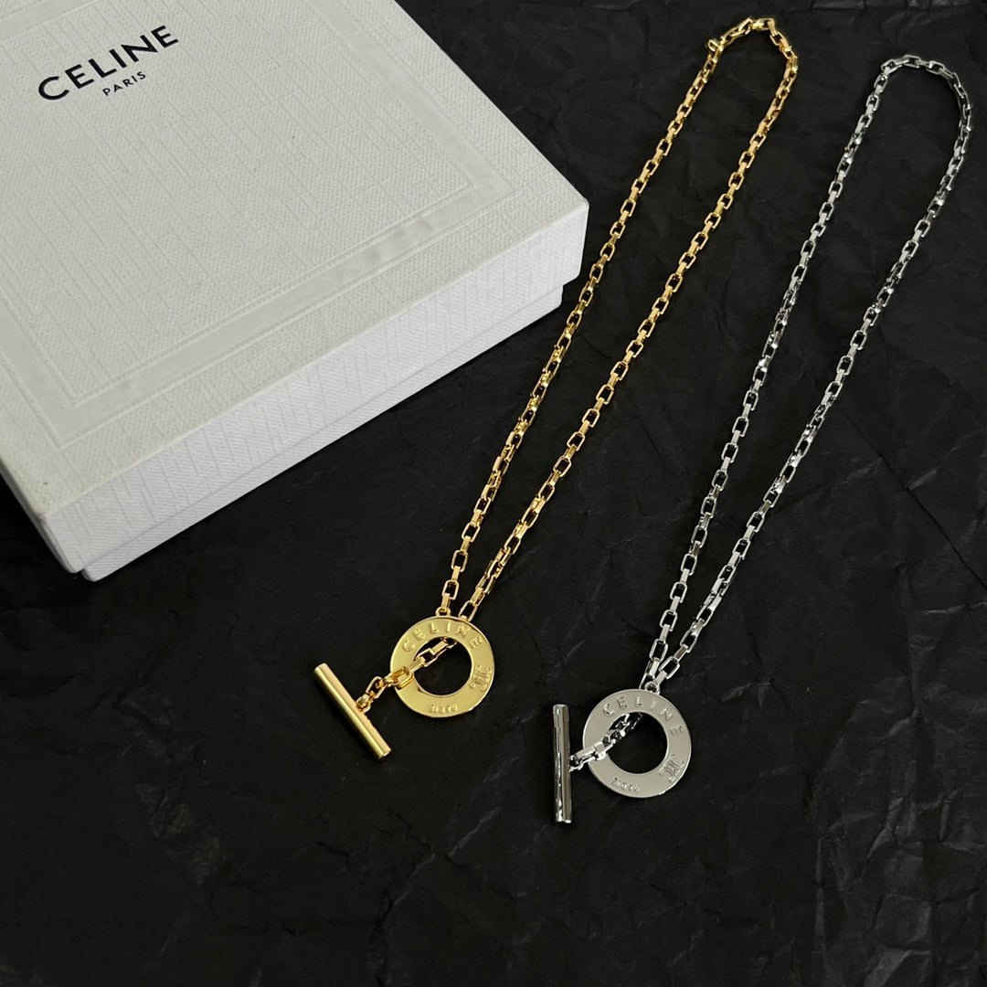 Martin Graham pendant necklace in polished metal-tone – detail view