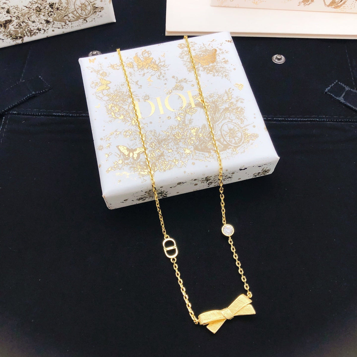 Martin Graham pendant necklace in polished metal-tone – detail view