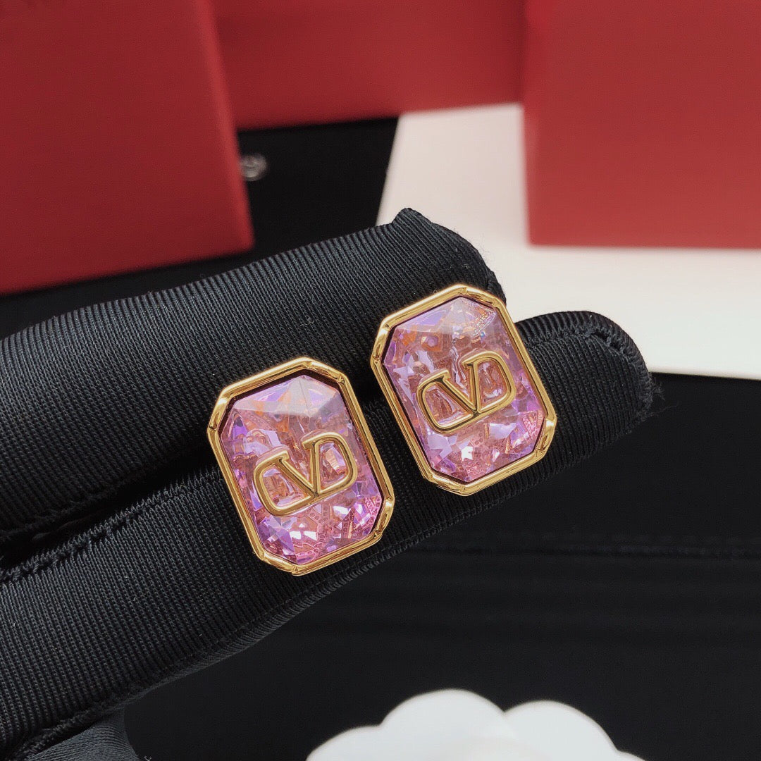 Martin Graham stud earrings in polished metal-tone – side detail