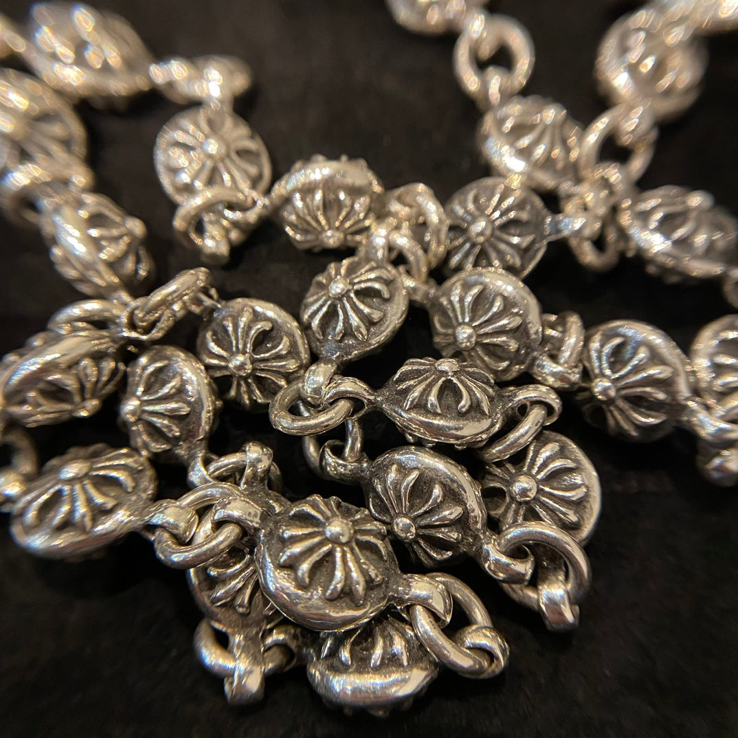 Martin Graham chain accessory in polished metal-tone – side detail