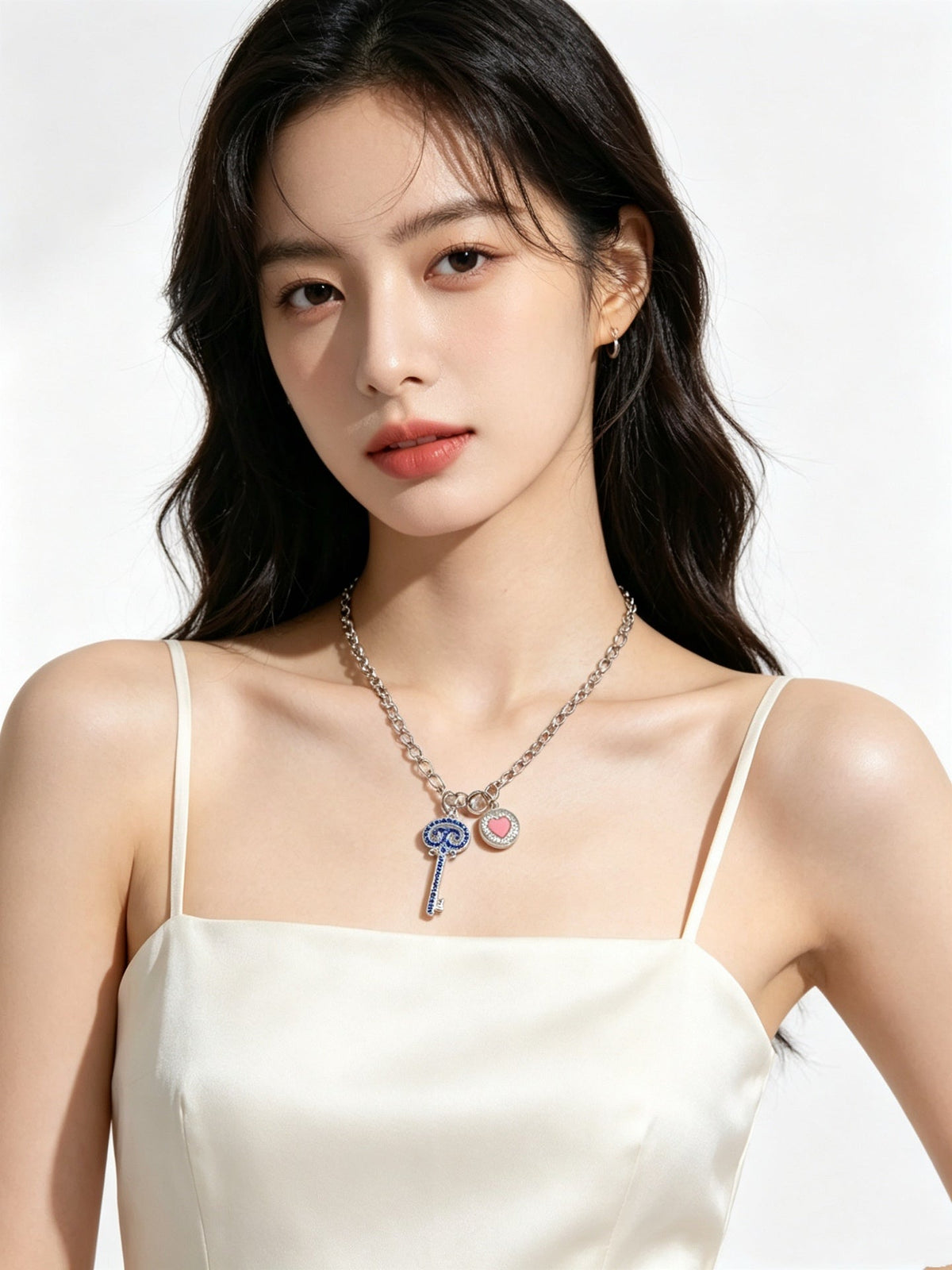 Martin Graham pendant necklace in polished metal-tone – side detail