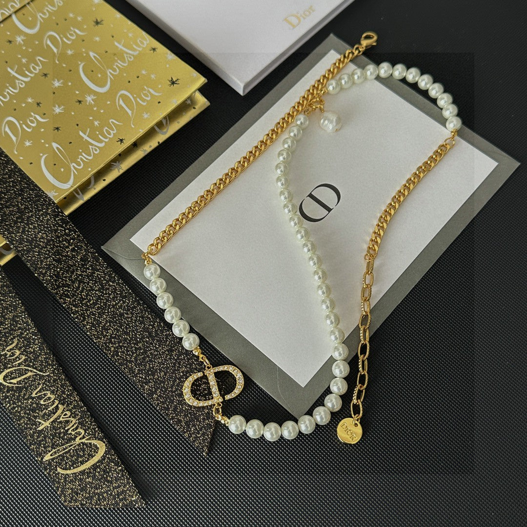 Martin Graham pendant necklace in polished metal-tone – side detail