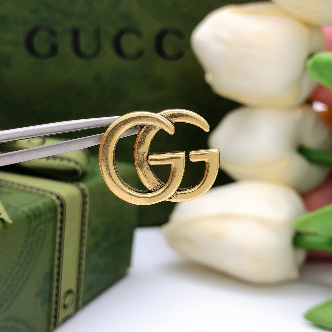 Martin Graham earrings in polished metal-tone – side detail