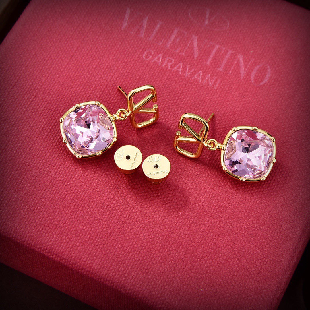 Martin Graham stud earrings in polished metal-tone – side detail