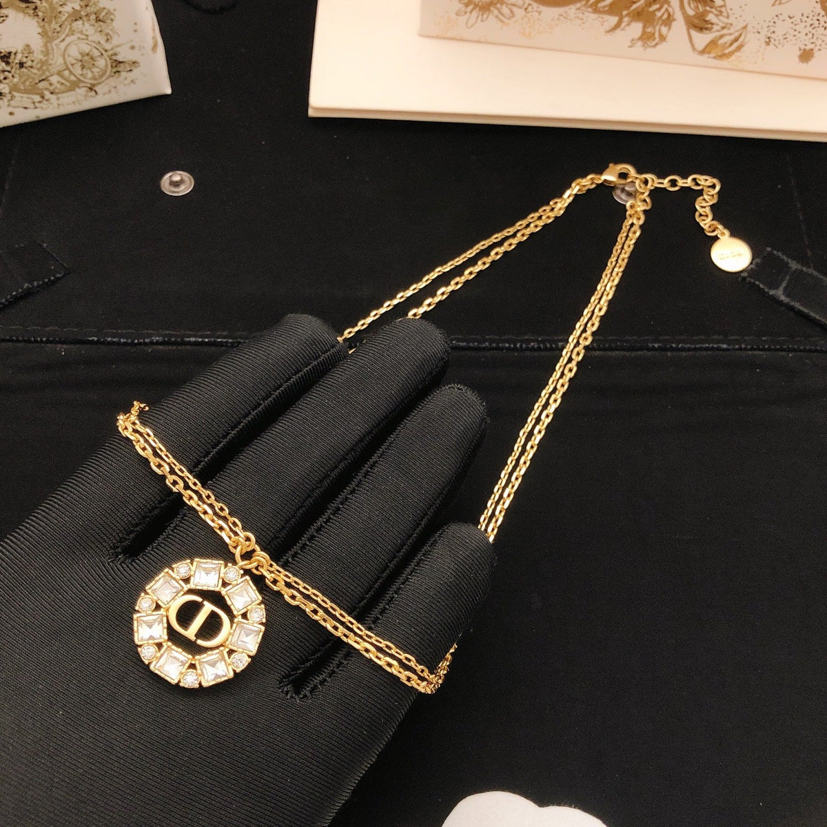 Martin Graham pendant necklace in polished metal-tone – side detail