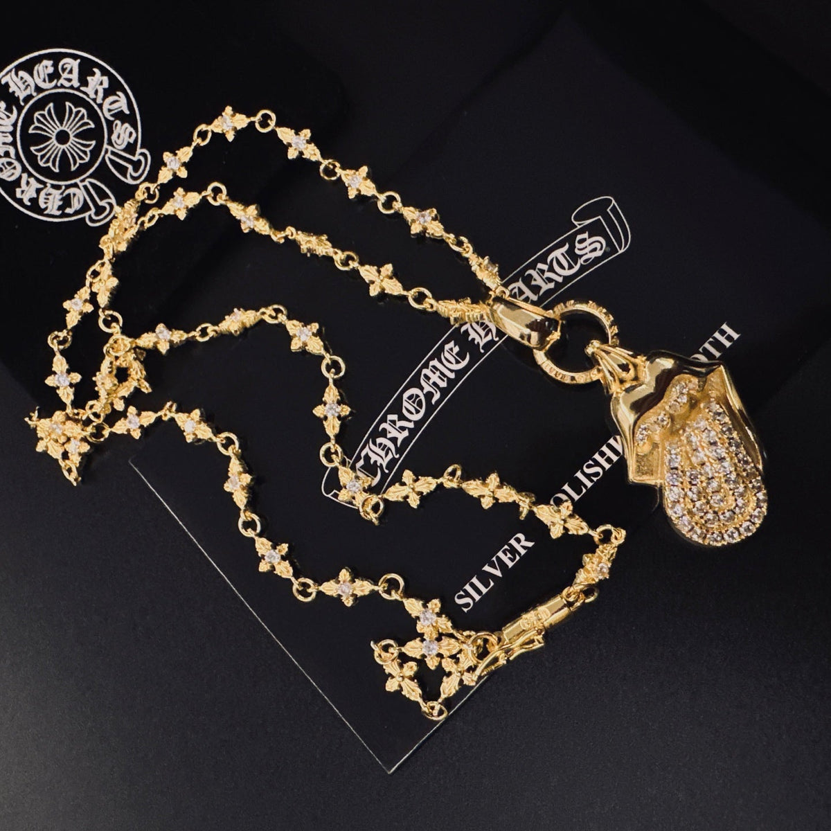 Martin Graham pendant necklace in polished metal-tone – side detail
