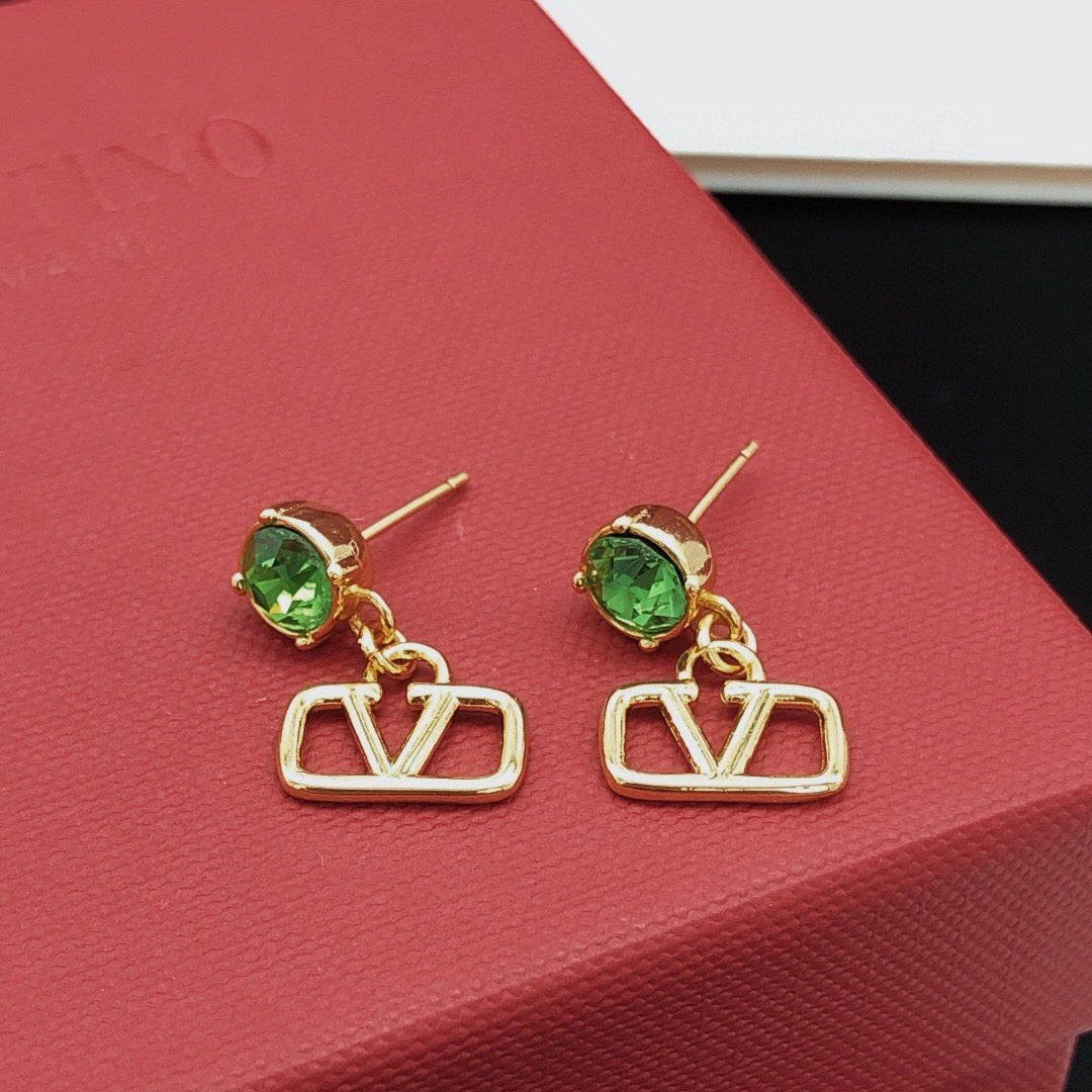 Martin Graham stud earrings in polished metal-tone – side detail