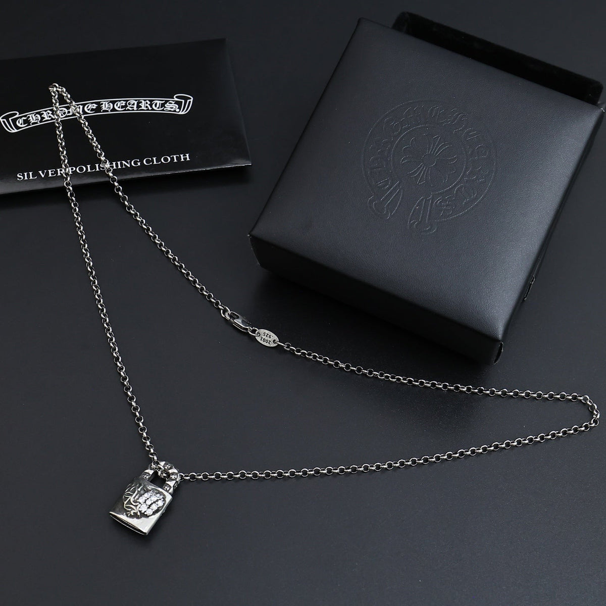 Martin Graham pendant necklace in polished metal-tone – side detail