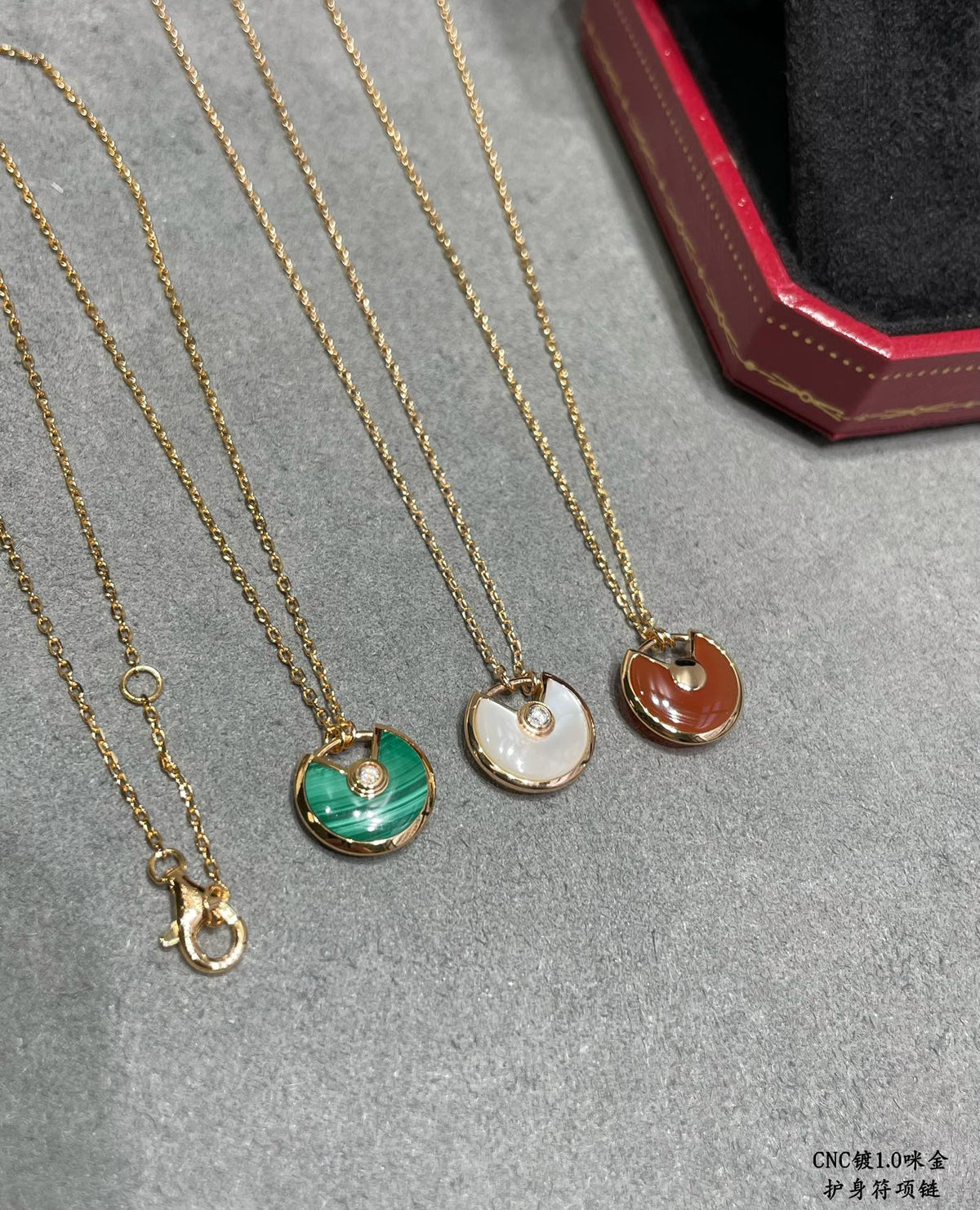 Martin Graham pendant necklace in polished metal-tone – side detail