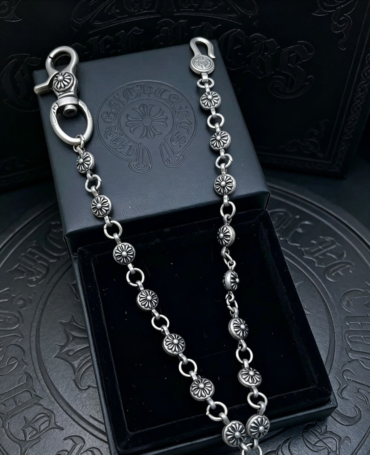 Martin Graham chain accessory in polished metal-tone – side detail