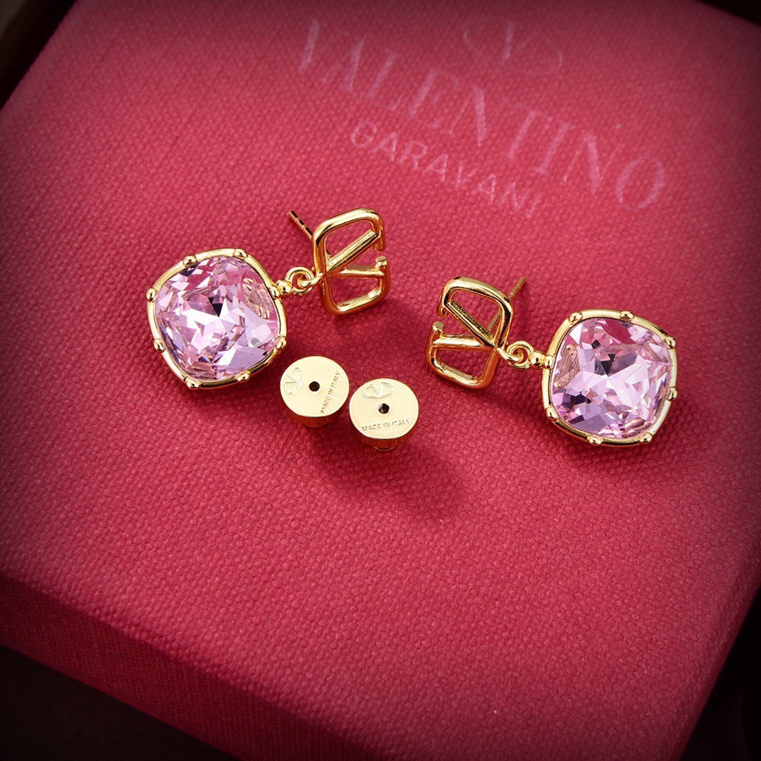 Martin Graham stud earrings in polished metal-tone – side detail
