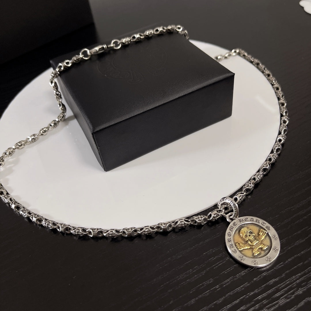 Martin Graham pendant necklace in polished metal-tone – side detail