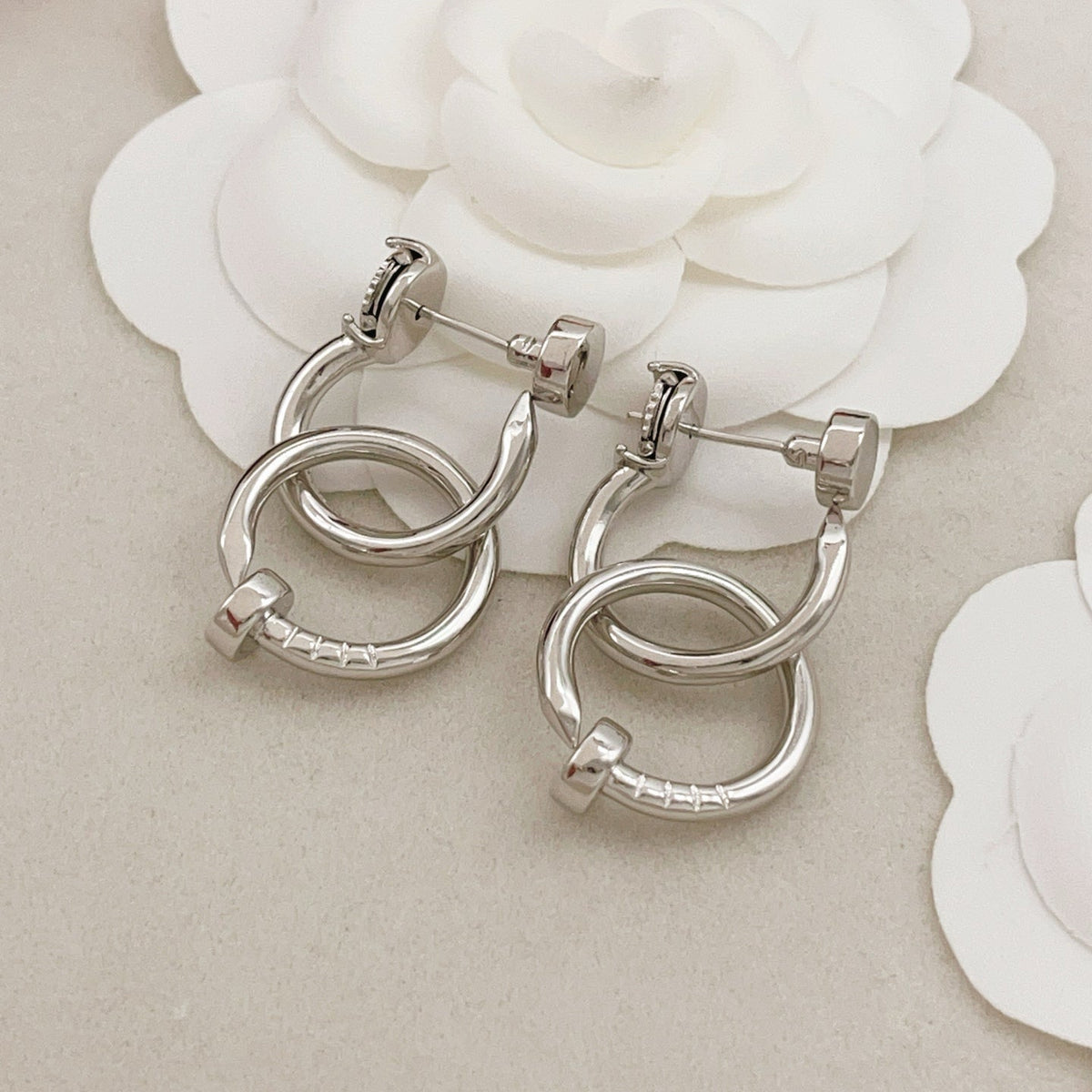 Martin Graham earrings in polished metal-tone – side detail