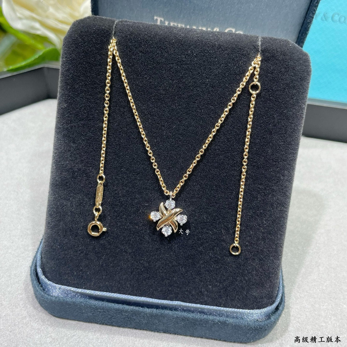 Martin Graham pendant necklace in polished metal-tone – side detail