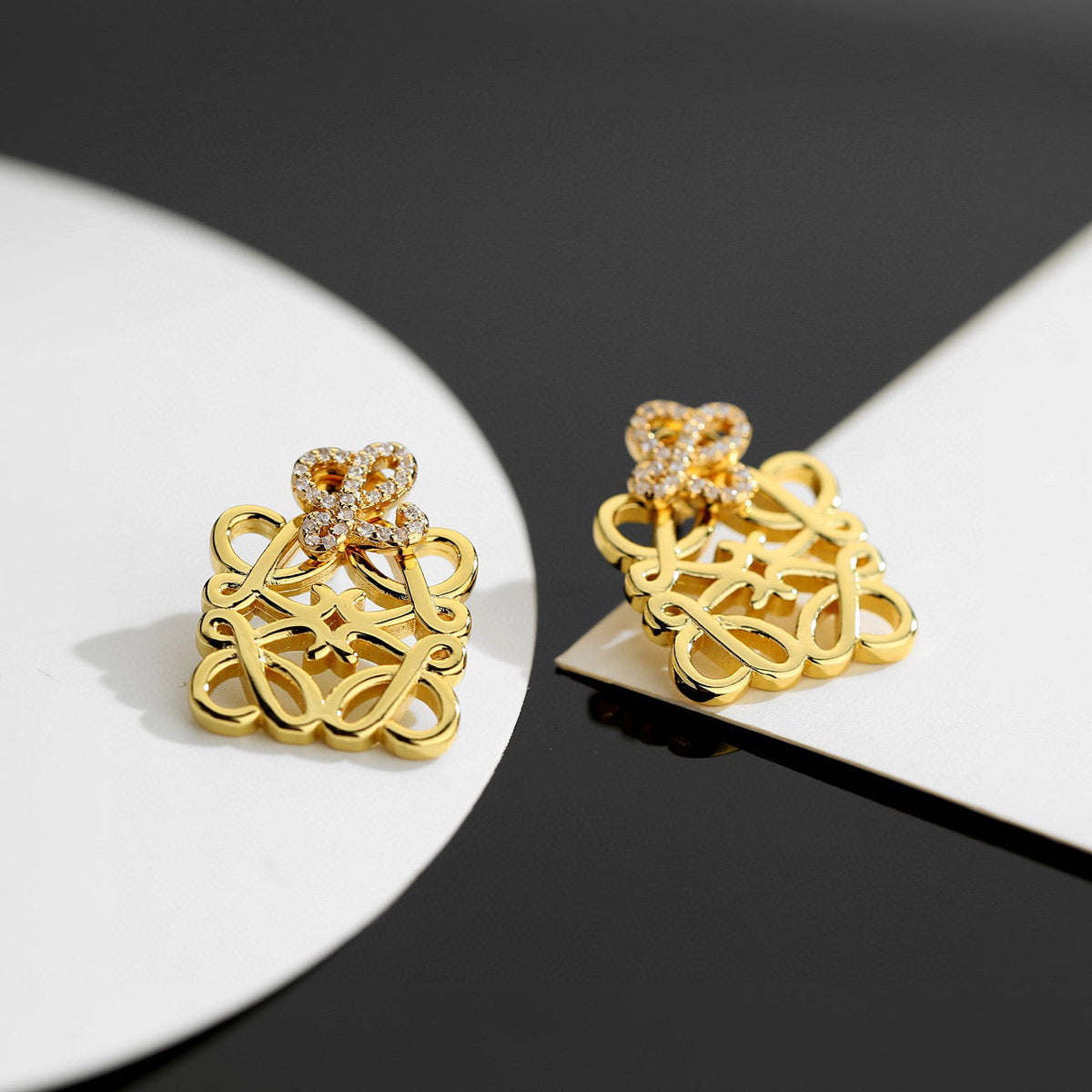 Martin Graham stud earrings in polished metal-tone – side detail