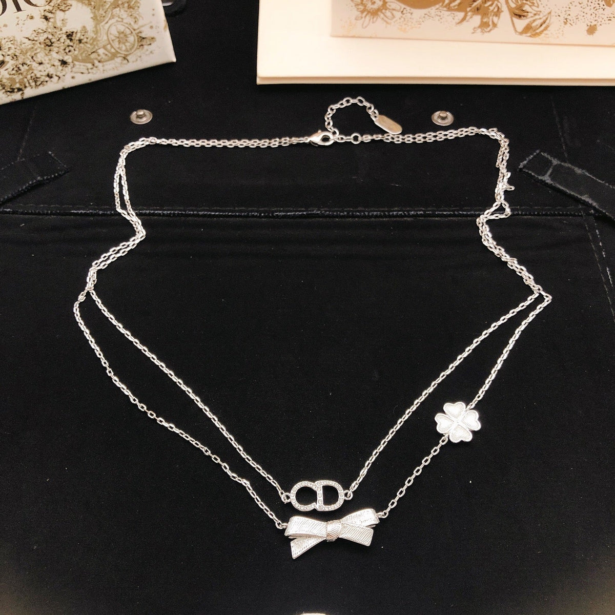 Martin Graham pendant necklace in polished metal-tone – side detail