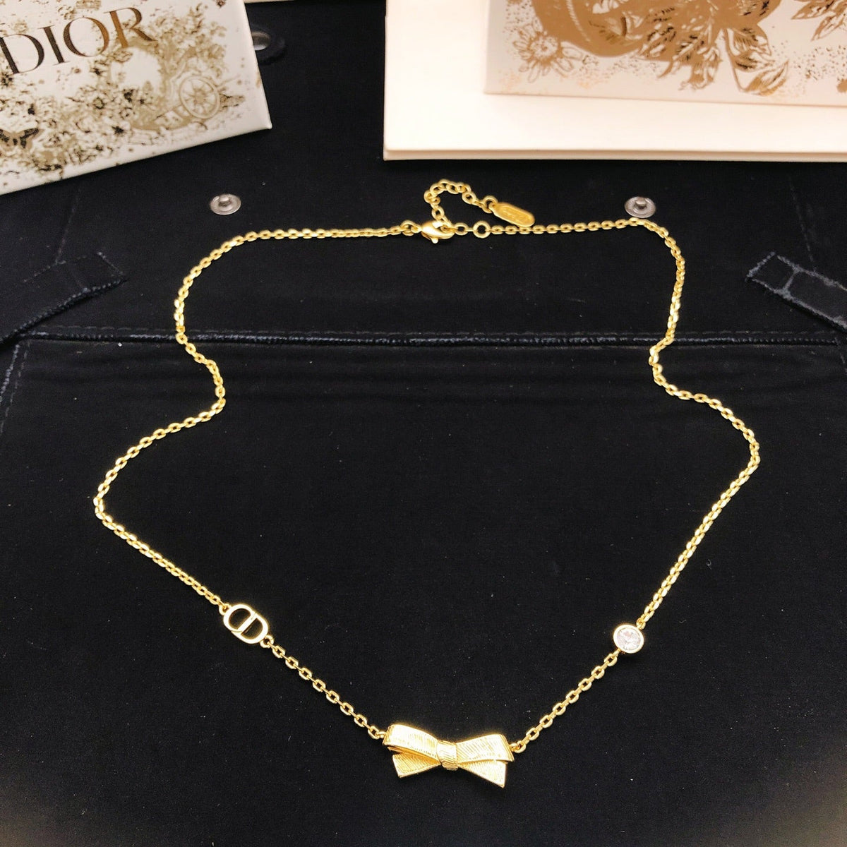 Martin Graham pendant necklace in polished metal-tone – side detail