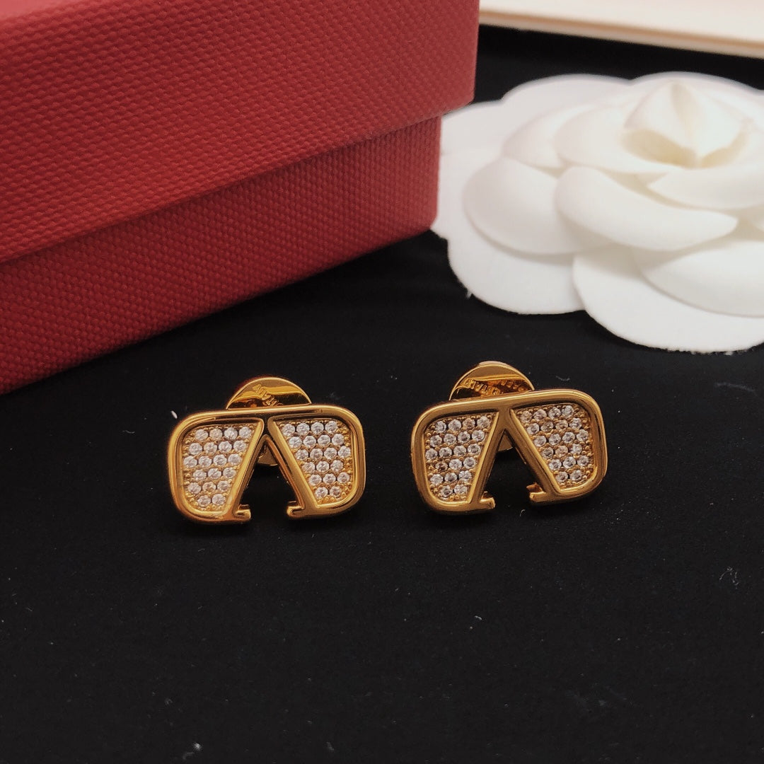 Martin Graham stud earrings in polished metal-tone – side detail