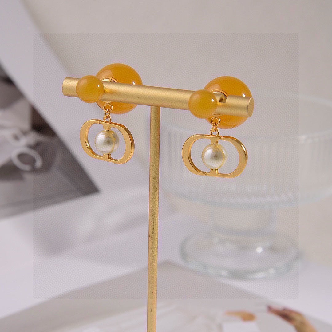 Martin Graham earrings in polished metal-tone – side detail