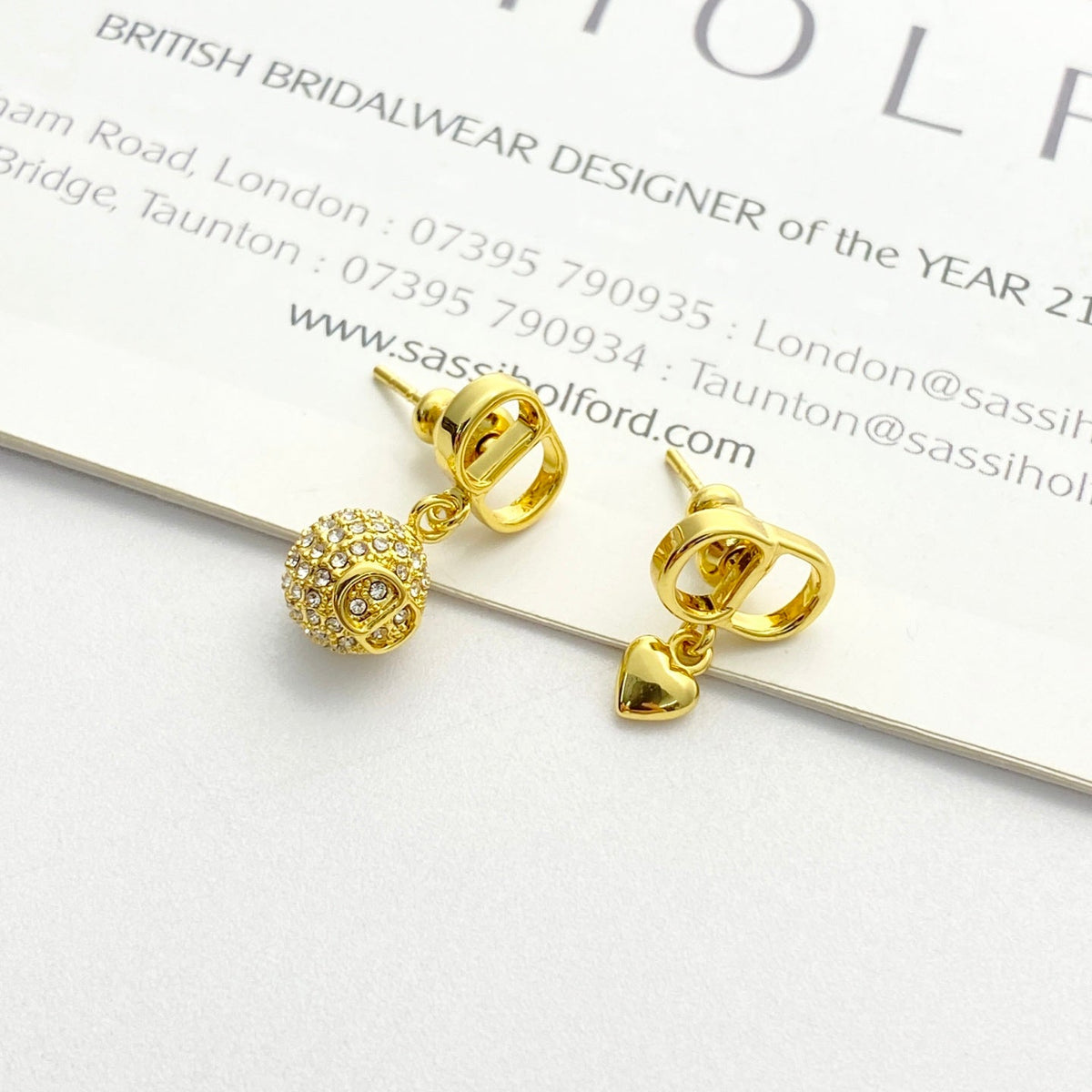Martin Graham stud earrings in polished metal-tone – side detail