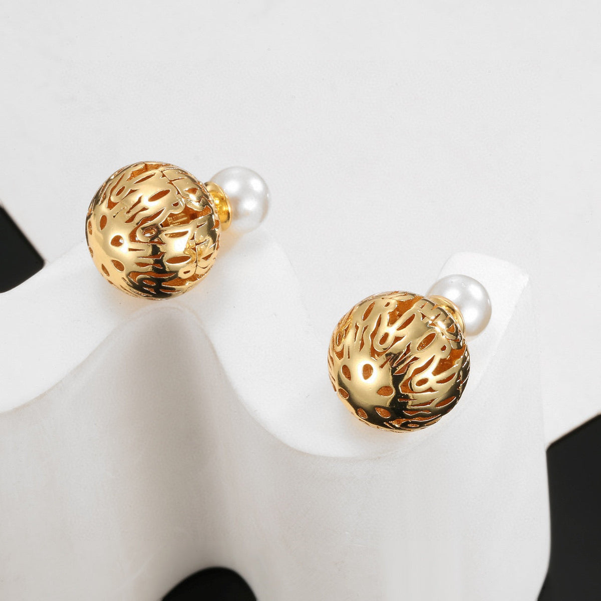 Martin Graham earrings in polished metal-tone – side detail
