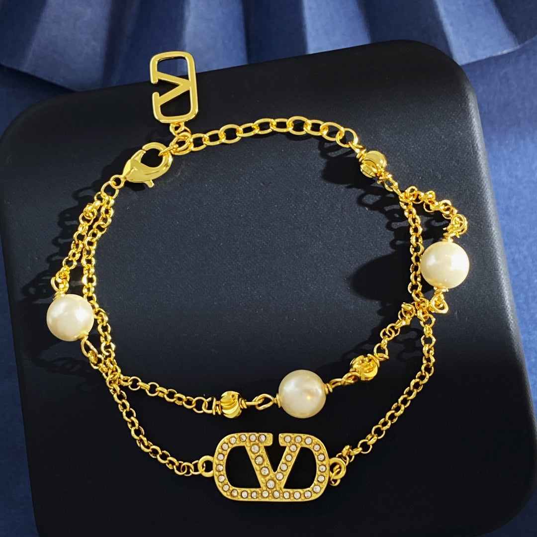 Martin Graham jewelry accessory in polished metal-tone – side detail