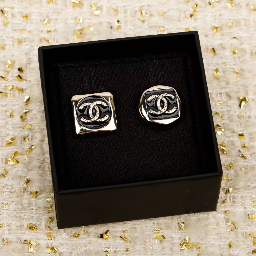 Martin Graham stud earrings in polished metal-tone – side detail