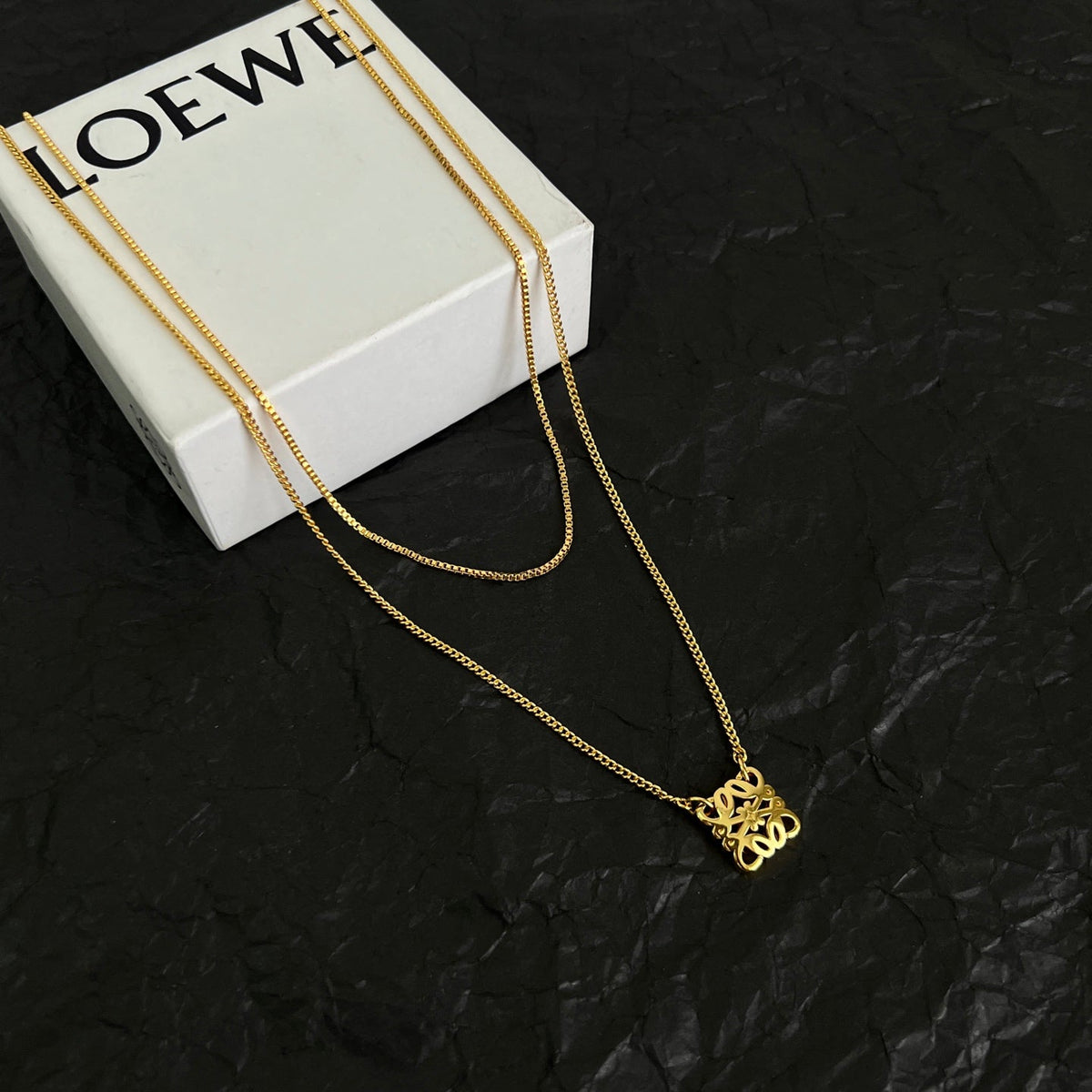Martin Graham pendant necklace in polished metal-tone – side detail