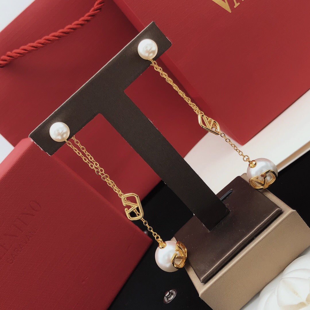 Martin Graham stud earrings in polished metal-tone – side detail