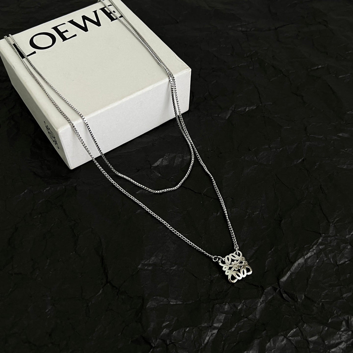 Martin Graham pendant necklace in polished metal-tone – side detail