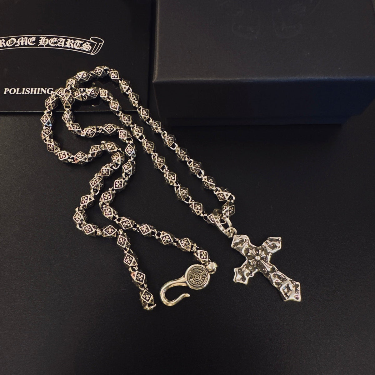 Martin Graham pendant necklace in polished metal-tone – side detail